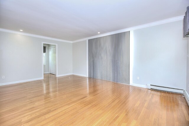 23 Davis Rd, Seymour, CT 06483 - unfurnished room with a baseboard radiator, ornamental molding, light wood-style flooring, and recessed lighting