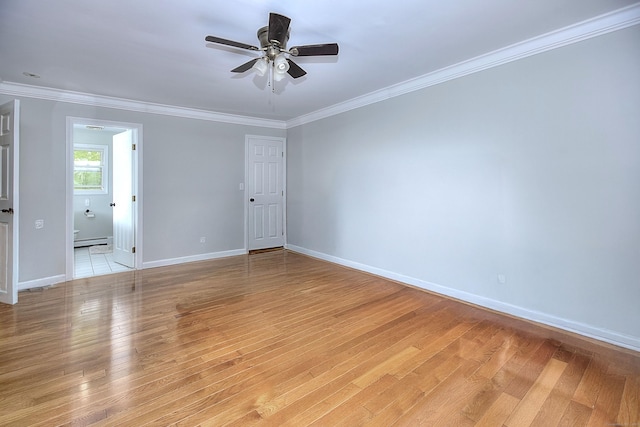23 Davis Rd, Seymour, CT 06483 - unfurnished room featuring a baseboard heating unit, crown molding, a ceiling fan, and light wood-style flooring