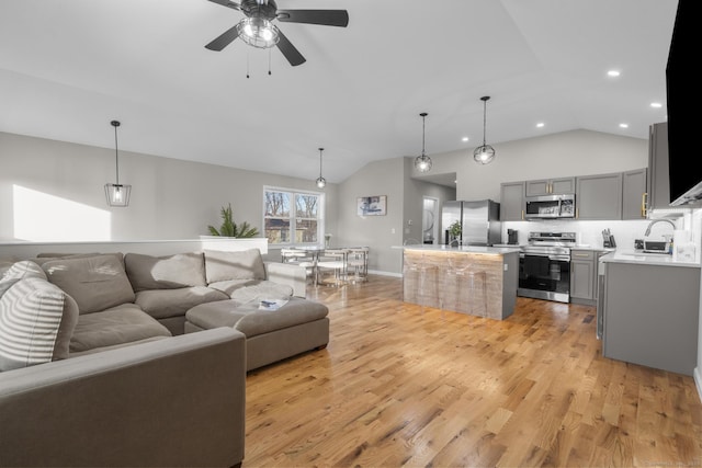 6 Bidwell Ter, Middletown, CT 06457 - living area with lofted ceiling, recessed lighting, a ceiling fan, and light wood-type flooring