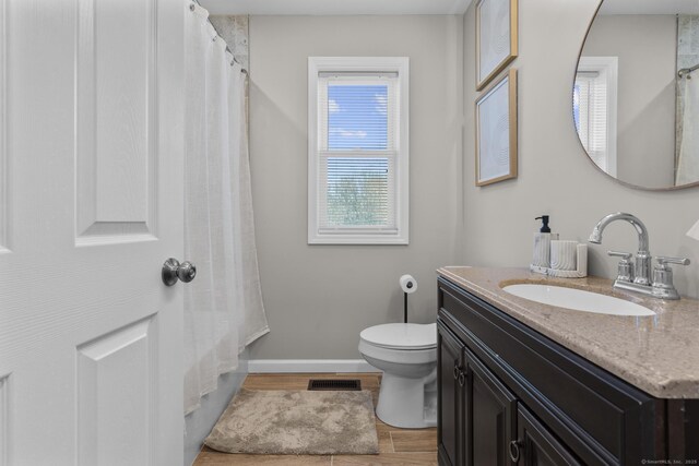 6 Bidwell Ter, Middletown, CT 06457 - bathroom featuring toilet, baseboards, vanity, wood finished floors, and a shower with curtain