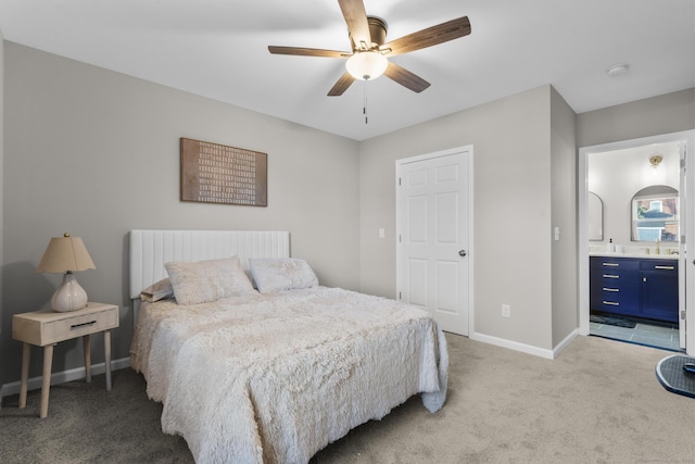 6 Bidwell Ter, Middletown, CT 06457 - bedroom featuring light colored carpet, baseboards, ceiling fan, a sink, and connected bathroom