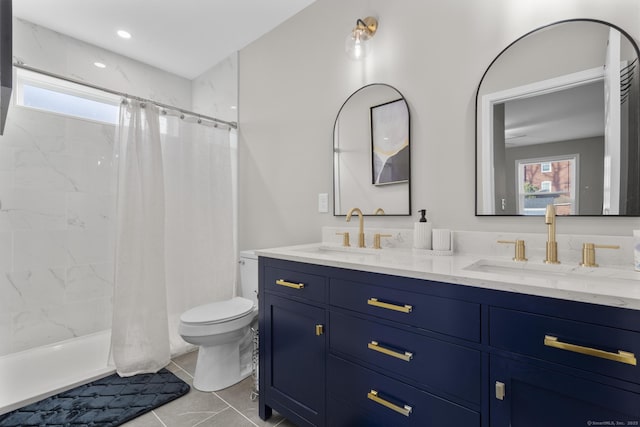 6 Bidwell Ter, Middletown, CT 06457 - full bathroom with toilet, double vanity, curtained shower, and tile patterned flooring