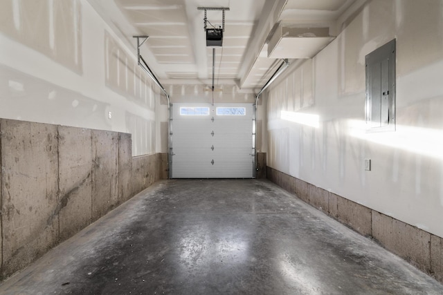 6 Bidwell Ter, Middletown, CT 06457 - garage featuring electric panel and a garage door opener