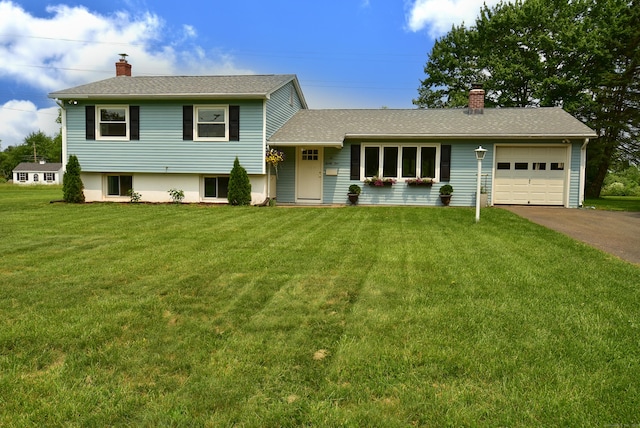 21 Craigmore Rd, Bloomfield, CT 06002 - tri-level home with a chimney, driveway, an attached garage, and a front lawn
