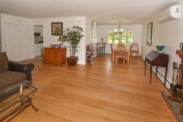 21 Craigmore Rd, Bloomfield, CT 06002 - living room with a wall mounted air conditioner, a chandelier, and light wood finished floors
