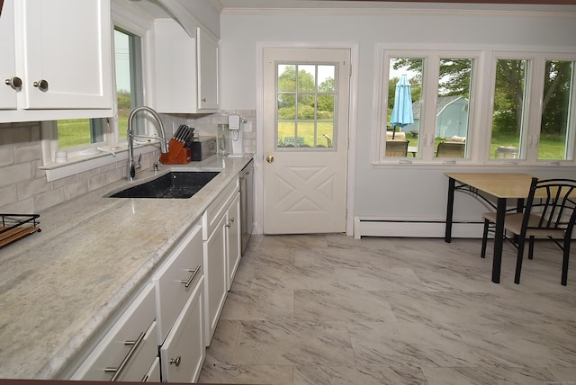 21 Craigmore Rd, Bloomfield, CT 06002 - kitchen featuring a sink, ornamental molding, decorative backsplash, white cabinets, and light stone counters