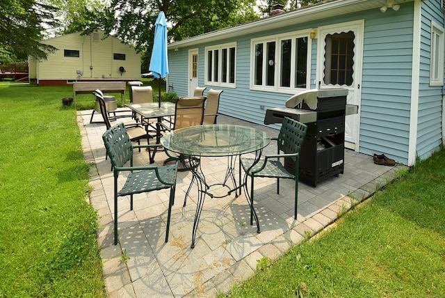 21 Craigmore Rd, Bloomfield, CT 06002 - view of patio / terrace with outdoor dining space and a grill