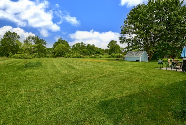 21 Craigmore Rd, Bloomfield, CT 06002 - view of green lawn featuring a patio