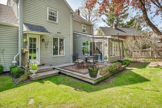 10 Meadowbrook Rd, Hamden, CT 06517 - rear view of property featuring a wooden deck, a sunroom, and a chimney