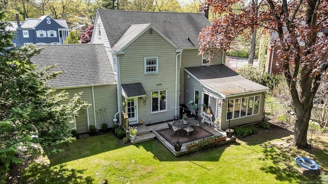 10 Meadowbrook Rd, Hamden, CT 06517 - back of house with a deck, roof with shingles, a lawn, and a chimney