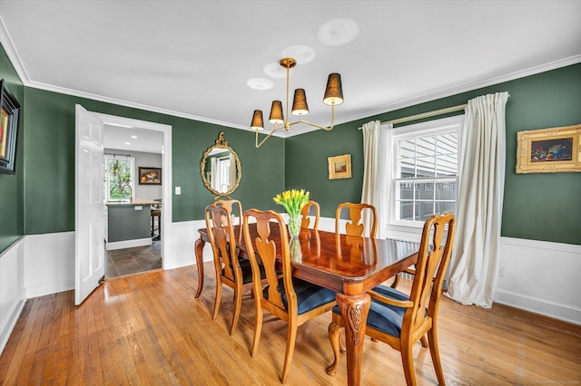 10 Meadowbrook Rd, Hamden, CT 06517 - dining space with crown molding, wainscoting, and wood finished floors