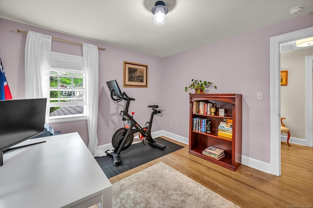 10 Meadowbrook Rd, Hamden, CT 06517 - exercise room with wood finished floors and baseboards