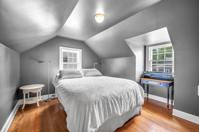 10 Meadowbrook Rd, Hamden, CT 06517 - bedroom featuring wood finished floors, lofted ceiling, and baseboards