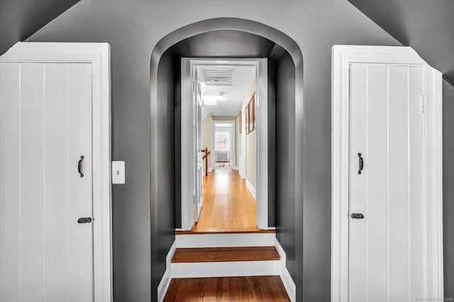 10 Meadowbrook Rd, Hamden, CT 06517 - hall with wood finished floors, baseboards, and arched walkways