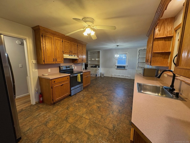 kitchen featuring stainless steel appliances, a sink, a baseboard radiator, a ceiling fan, and under cabinet range hood