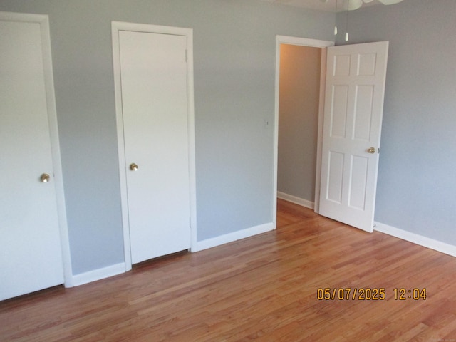 51-71 Park Ave Unit 3-21, Danbury, CT 06810 - unfurnished bedroom with wood finished floors and baseboards