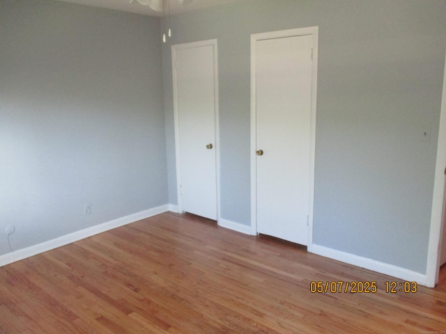 51-71 Park Ave Unit 3-21, Danbury, CT 06810 - unfurnished bedroom featuring wood finished floors and baseboards