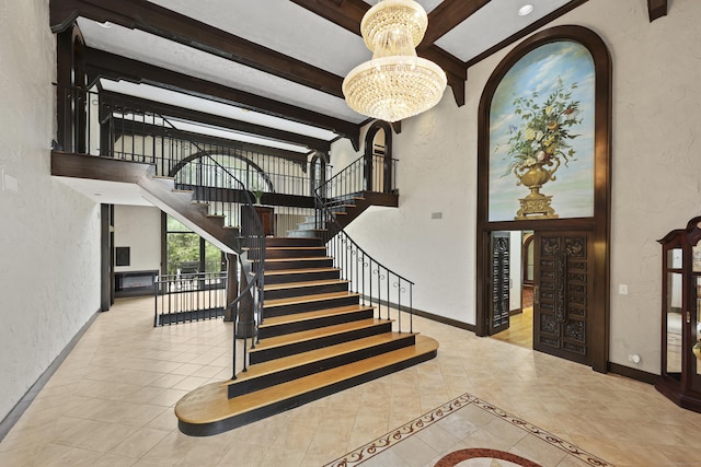 46 Mountain Farms Rd, West Hartford, CT 06117 - staircase featuring beamed ceiling, a chandelier, tile patterned flooring, a textured wall, and baseboards