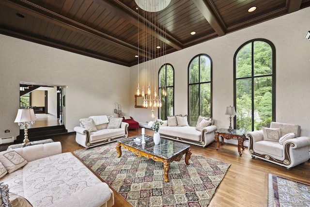 46 Mountain Farms Rd, West Hartford, CT 06117 - living area with a textured wall, wood ceiling with exposed beams, wood finished floors, and a chandelier