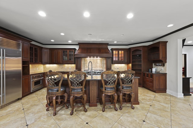 46 Mountain Farms Rd, West Hartford, CT 06117 - kitchen featuring appliances with stainless steel finishes, premium range hood, ornamental molding, recessed lighting, and backsplash
