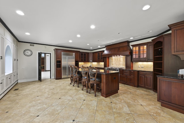 46 Mountain Farms Rd, West Hartford, CT 06117 - kitchen featuring stainless steel built in refrigerator, crown molding, premium range hood, recessed lighting, and backsplash
