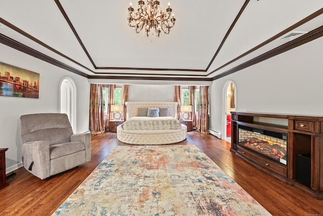 46 Mountain Farms Rd, West Hartford, CT 06117 - bedroom with lofted ceiling, crown molding, a baseboard radiator, a chandelier, and arched walkways
