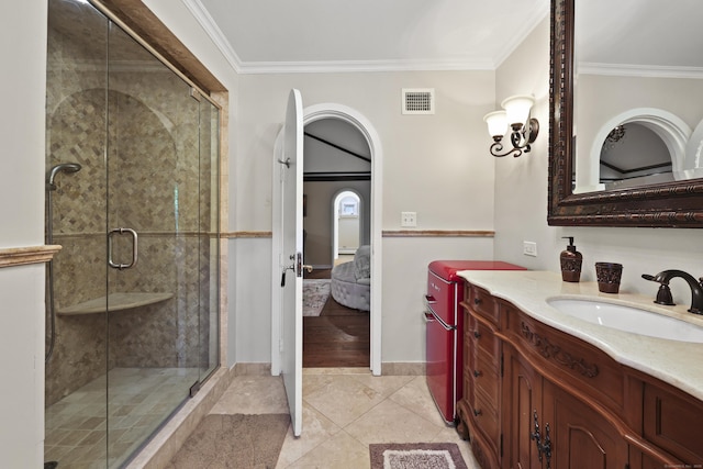 46 Mountain Farms Rd, West Hartford, CT 06117 - full bathroom featuring connected bathroom, vanity, crown molding, a stall shower, and tile patterned flooring