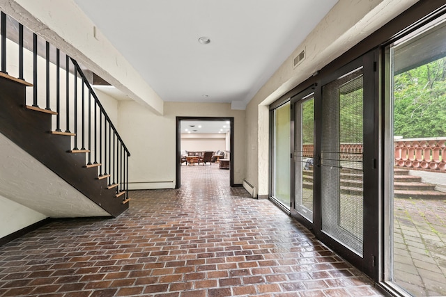 46 Mountain Farms Rd, West Hartford, CT 06117 - hall with a baseboard radiator, brick flooring, plenty of natural light, and a baseboard heating unit