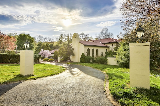46 Mountain Farms Rd, West Hartford, CT 06117 - mediterranean / spanish-style house featuring stucco siding and asphalt driveway