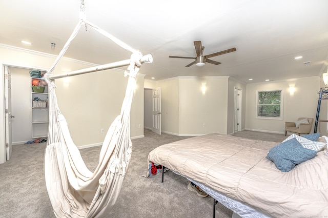 bedroom featuring ornamental molding, carpet floors, a ceiling fan, baseboards, and recessed lighting
