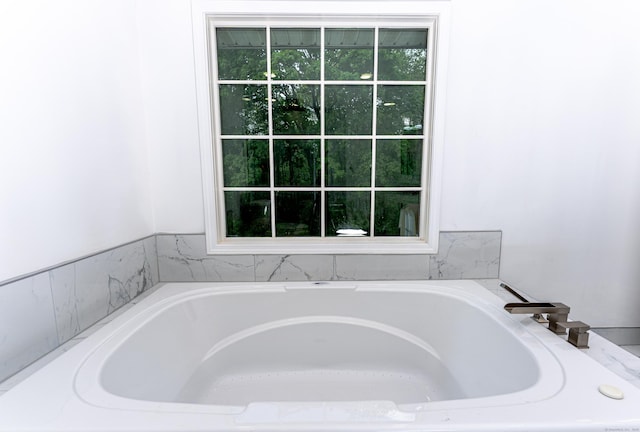 full bathroom featuring a garden tub