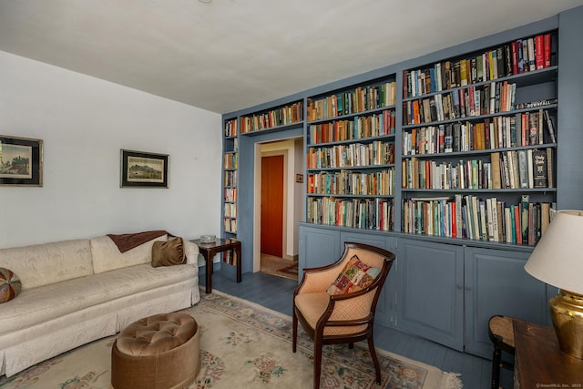 sitting room featuring wood finished floors