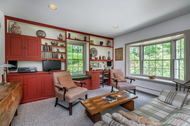 living area featuring a baseboard radiator, light colored carpet, and recessed lighting