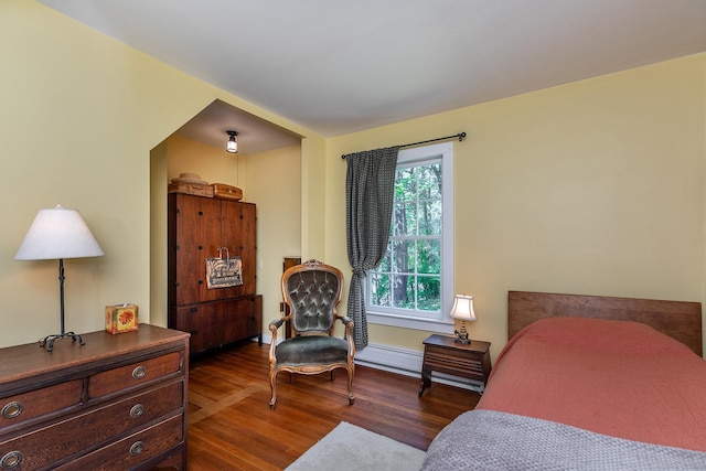 bedroom with wood finished floors