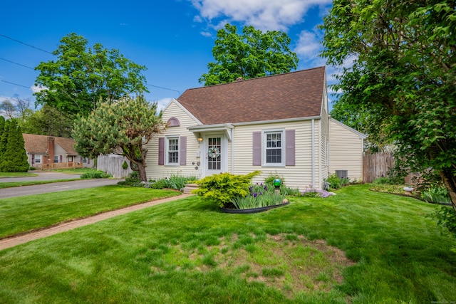 4 Hockanum Dr, East Hartford, CT 06118 - cape cod-style house featuring roof with shingles