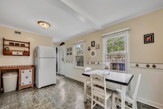 4 Hockanum Dr, East Hartford, CT 06118 - dining room featuring ornamental molding, stone finish flooring, and wainscoting