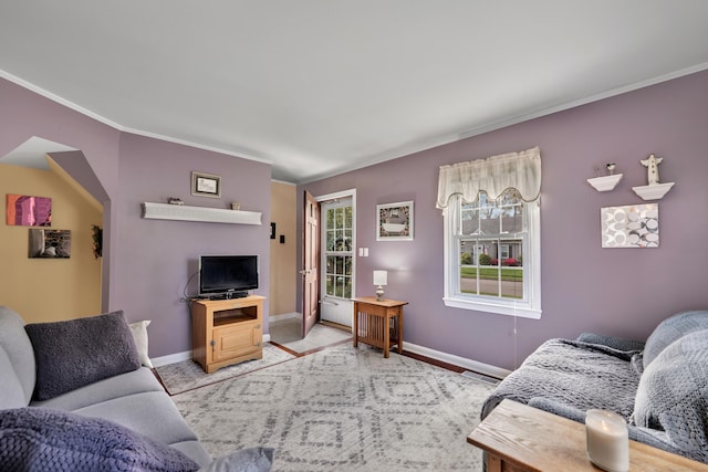 4 Hockanum Dr, East Hartford, CT 06118 - living room with plenty of natural light and ornamental molding