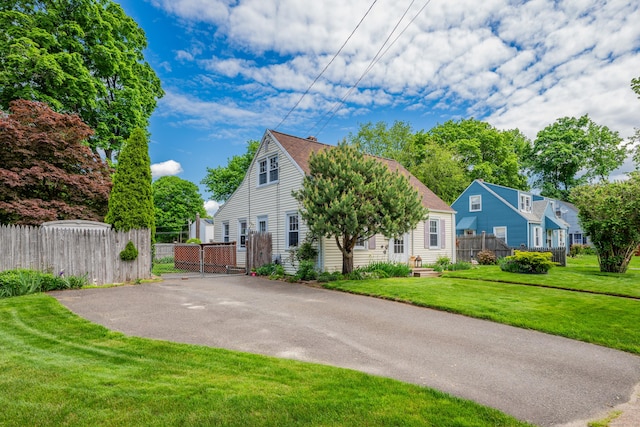 4 Hockanum Dr, East Hartford, CT 06118 - view of front of home with driveway and a gate