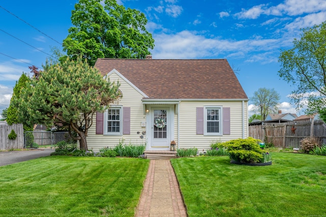 4 Hockanum Dr, East Hartford, CT 06118 - cape cod-style house featuring a shingled roof and a chimney