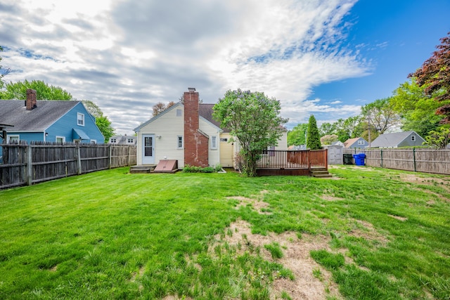 4 Hockanum Dr, East Hartford, CT 06118 - fenced backyard featuring a wooden deck and a storage shed