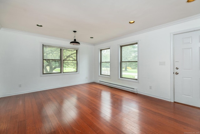 433 Kent Cornwall Rd Unit 14, Kent, CT 06757 - spare room featuring a baseboard heating unit, healthy amount of natural light, hardwood / wood-style floors, baseboards, and ornamental molding