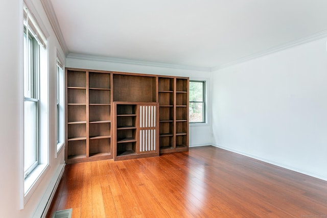 433 Kent Cornwall Rd Unit 14, Kent, CT 06757 - spare room featuring light wood-style flooring, crown molding, baseboards, and a baseboard radiator