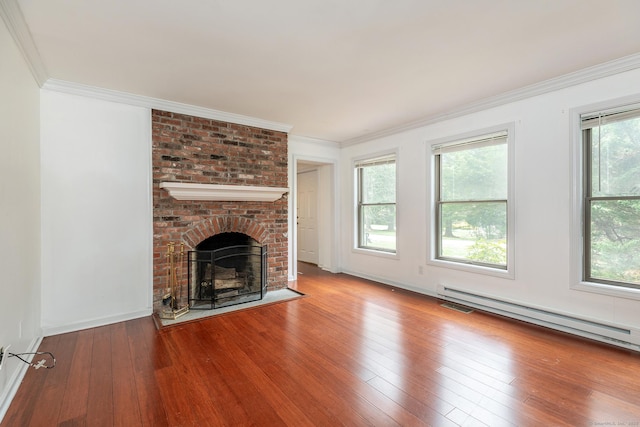 433 Kent Cornwall Rd Unit 14, Kent, CT 06757 - unfurnished living room with hardwood / wood-style flooring, healthy amount of natural light, baseboard heating, and ornamental molding