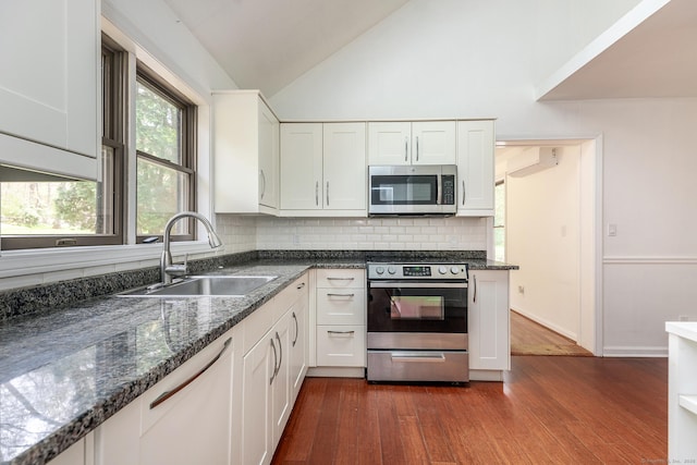 433 Kent Cornwall Rd Unit 14, Kent, CT 06757 - kitchen featuring stainless steel appliances, a sink, dark wood-type flooring, tasteful backsplash, and white cabinets