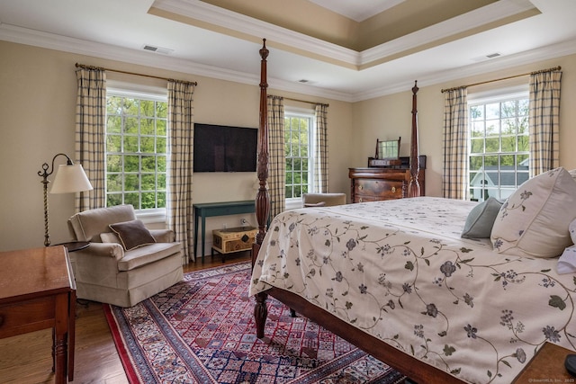 37 Lantern Hill Rd, Madison, CT 06443 - bedroom featuring a raised ceiling, multiple windows, wood finished floors, and ornamental molding