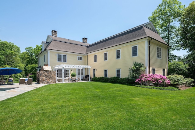 37 Lantern Hill Rd, Madison, CT 06443 - rear view of house featuring a pergola, a patio, a lawn, and a chimney