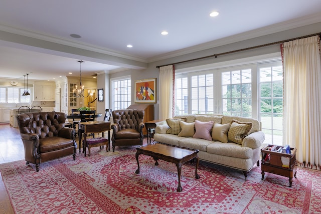 37 Lantern Hill Rd, Madison, CT 06443 - living area with a chandelier, healthy amount of natural light, crown molding, recessed lighting, and light wood-type flooring