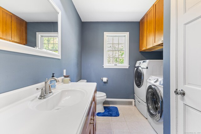 241 New London Rd, Colchester, CT 06415 - bathroom featuring washing machine and clothes dryer, tile patterned flooring, toilet, vanity, and baseboards