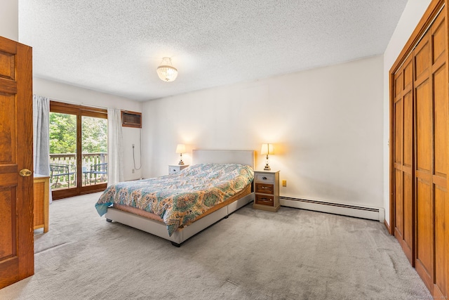 241 New London Rd, Colchester, CT 06415 - bedroom featuring a baseboard radiator, light carpet, access to outside, a textured ceiling, and a closet