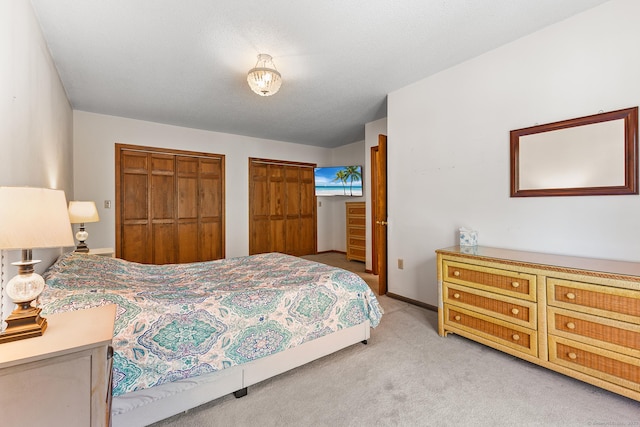 241 New London Rd, Colchester, CT 06415 - bedroom featuring multiple closets and light colored carpet